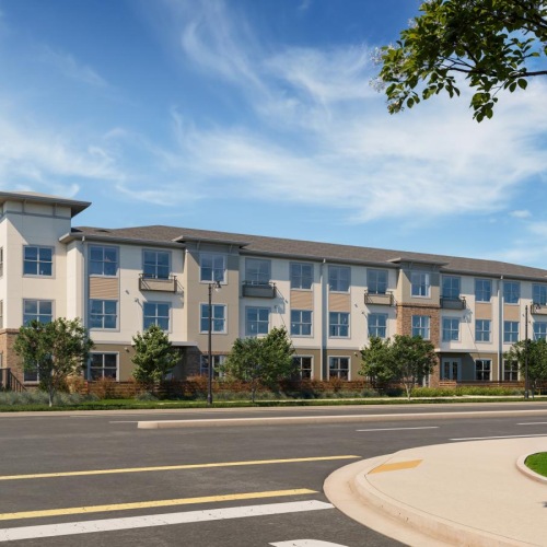 a large building with a parking lot