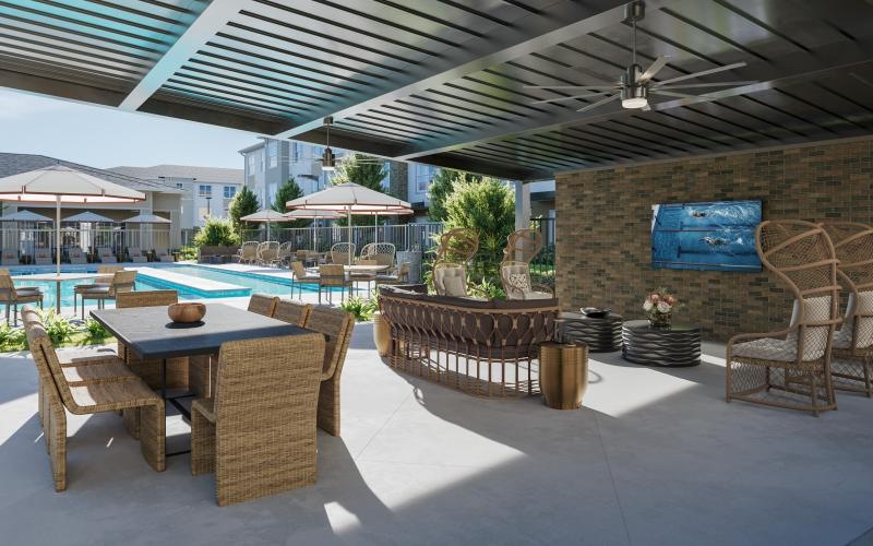 a patio with a pool and chairs
